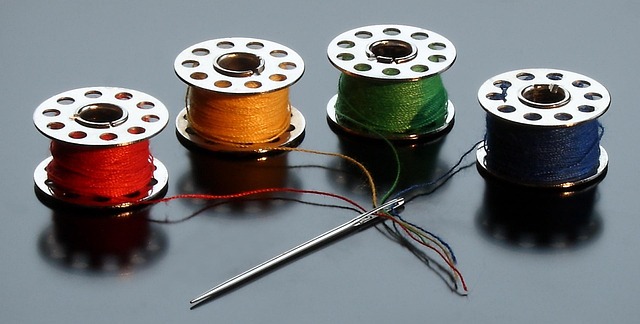 beginner sewing setup with fabric scraps thread blunt needles and child-safe scissors