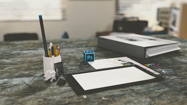 modern family creativity workspace with pastel stationery and fabric pieces